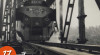 Foto saat Peresmian Jalan Kereta Api di Atas Jembatan Kali Progo, Kereta lokomotif istimewa yang membawa tamu undangan dari Yogyakarta yang melewati jembatan Bantar di atas Sungai Progo, 17 Juni 1951.